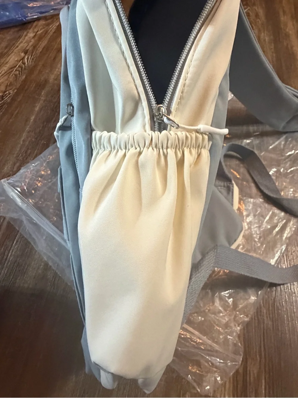 Light Gray Canvas Backpack with Cream Sides